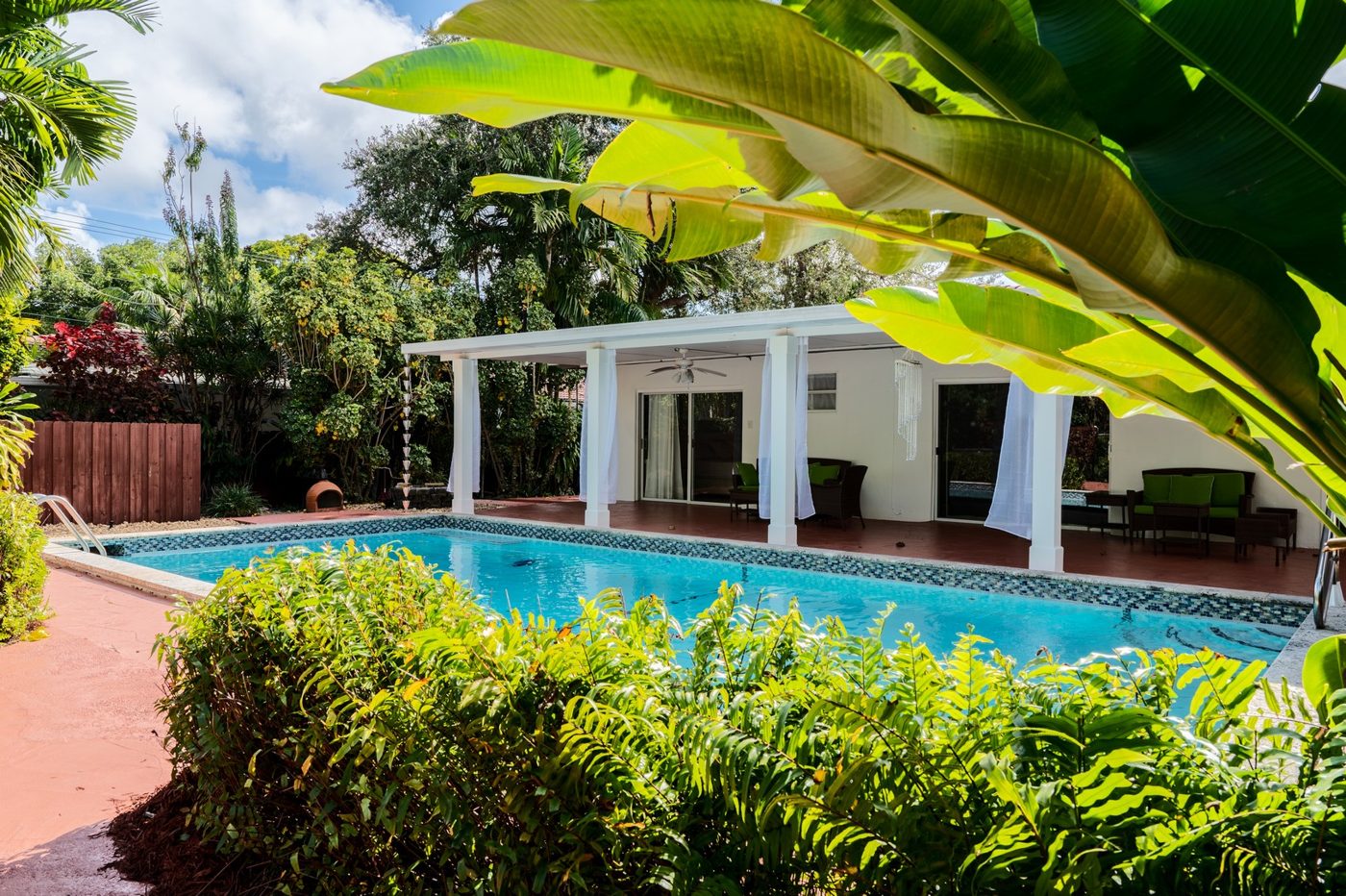 Pool and covered terrace at 951 NE 83rd Street