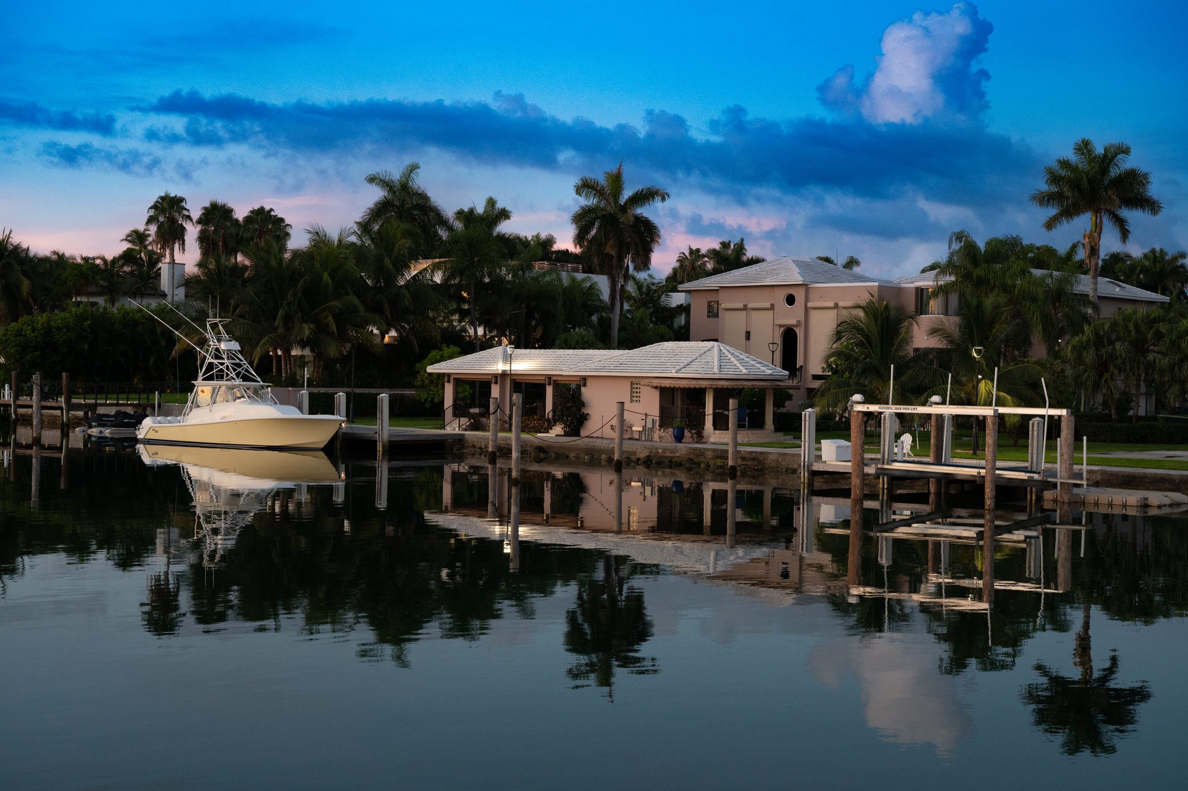 Waterfront home on Palm Island at dusk